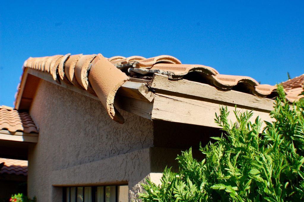 Damage to roof on house from storm